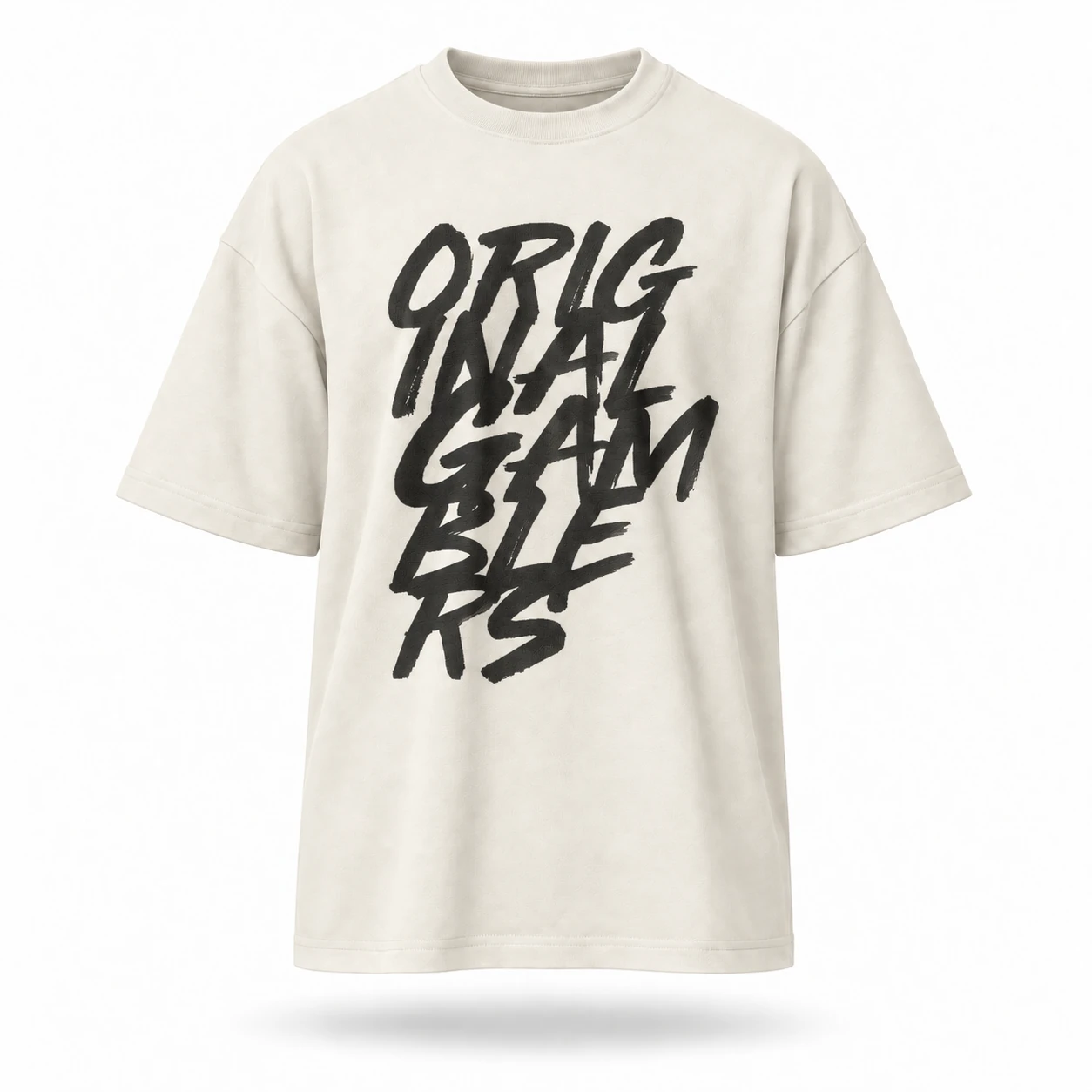 Playera oversize crema con el lettering a pincel Original Gamblers en negro al frente